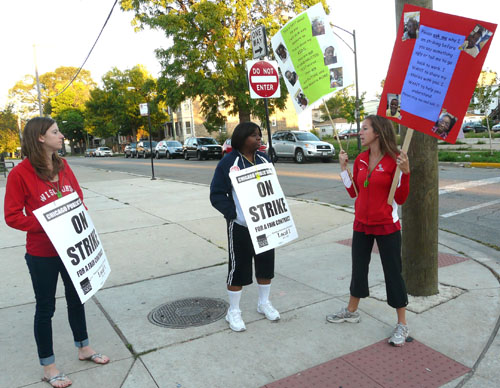 Striking teachers picket outside Hefferan Elementary School on Chicago's West Side before seven in the morning on September 12, 2012, some carrying CTU signs, others with their own clear messages. Substance photo by Kati Gilson. 
