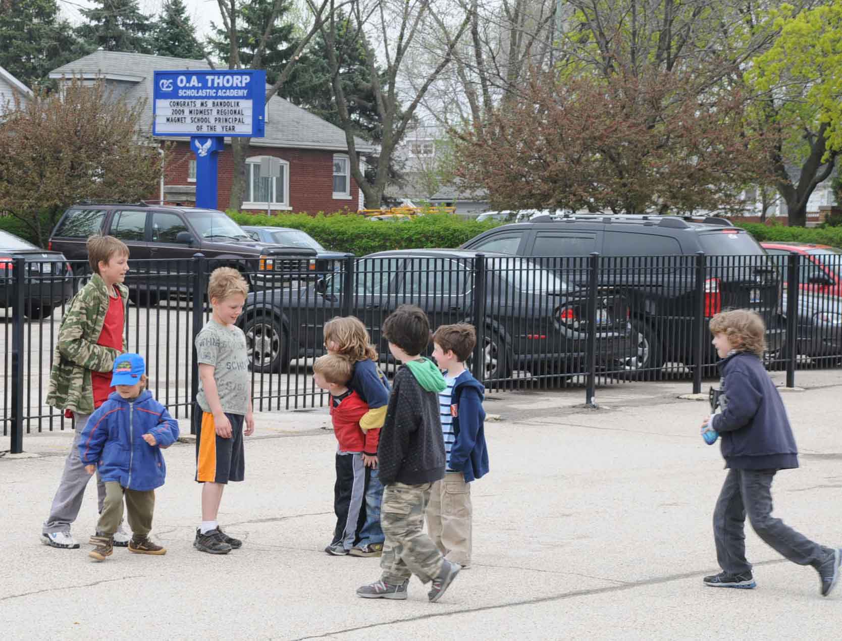 Boys from O.A. Thorp playing after school in April 2009. Substance photo by George N. Schmidt.