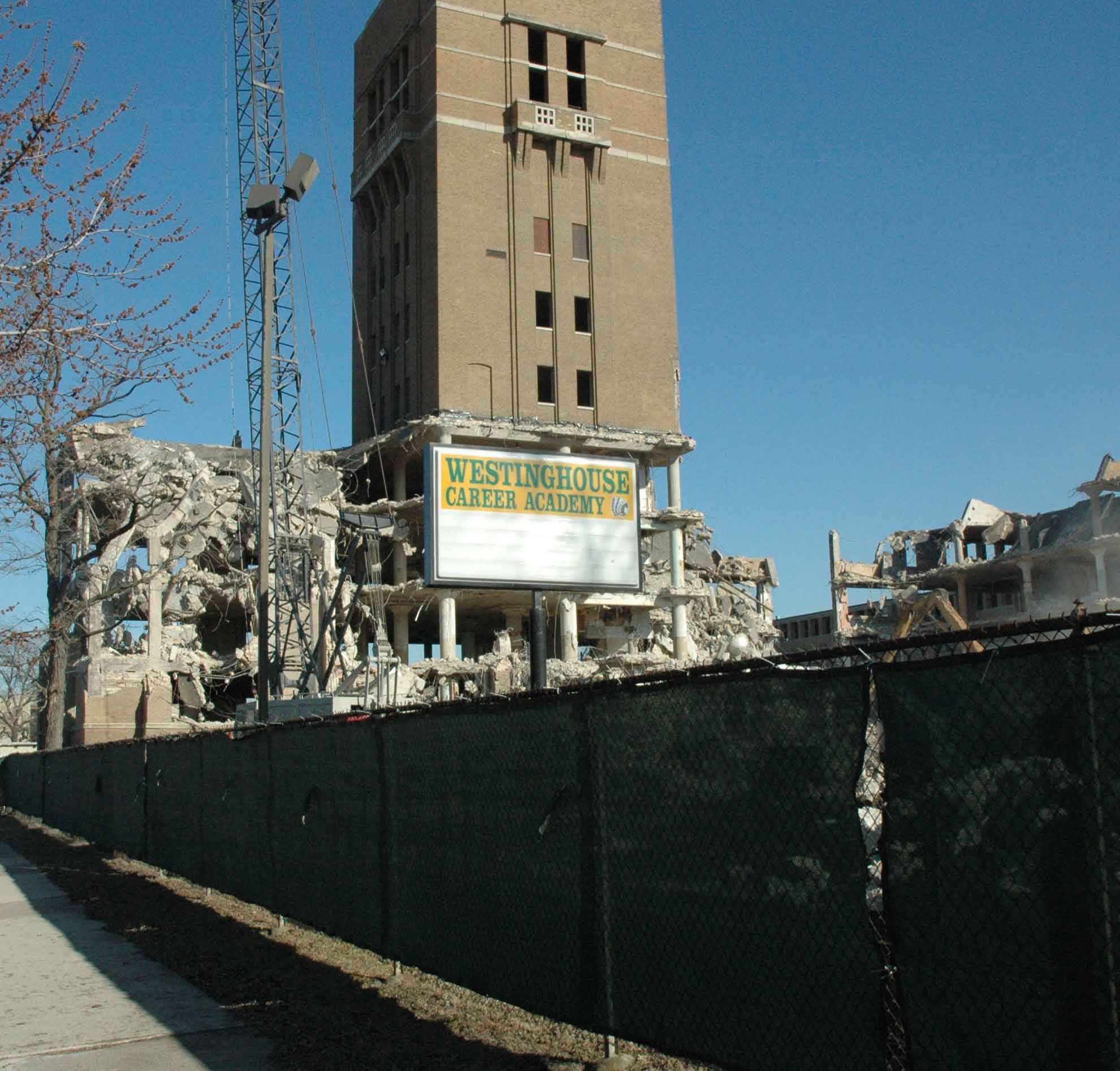 The new Westinghouse High School is being built on Franklin Blvd. east of the site of the old Westinghouse (above, being demolished). The new Westinghouse will cost Chicago an estimated $100 million. While the school is being built adjacent to the site of the old school (demolition photograph from June 2008 above), the Chicago Board of Education has deprived the high school students of the community (Austin) of a general public high school for the past three years. After closing Austin High School as a general public high school, the Daley administration began slowly to privatize the Austin building. First came a charter schools (