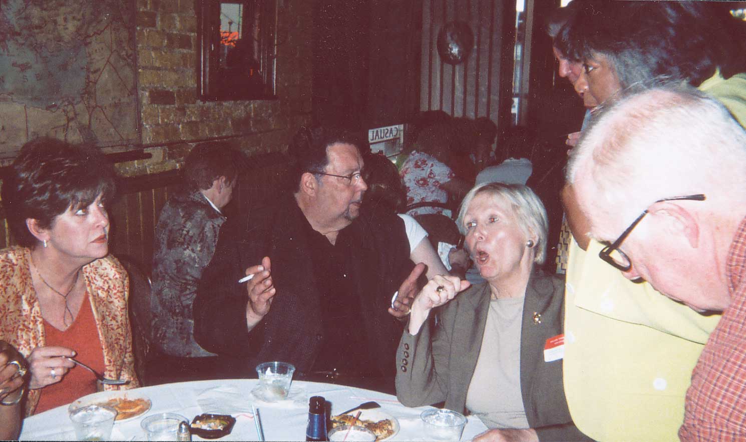 In her May report on the precarious financial situation of the Chicago Teachers Union, CTU President Marilyn Stewart (partly obscured, above right behind former CTU research chief Tom Feeley, far right) spared no blame in reviewing the history of the union.
<br />According to Stewart, her three predecessors (Jacqueline Vaughn, who died in 1994; Tom Reece (above, center), who served from 1994 to 2001; and Deborah Lynch, who served from 2001 until August 2004) were mainly to blame. According to Stewart, the three previous presidents of the CTU caused a deficit that required that the union borrow $3 million in the past seven months. In addition to blaming the venerated CTU President Jacqueline Vaughn (1984 - 1994), who died in 1994, Stewart also blamed Vaughn’s successor Tom Reece (above, second from left), and, of course, Deborah Lynch, whom she had blamed for just about everything during her first term in office.
<br />Stewart’s version of reality is that Vaughn and Reece initiated 
