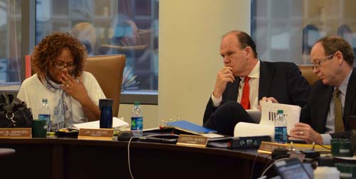 Chicago Teachers Pension Fund trustees Lois Ashford (left) and Jay Rehak (center) listen to one of the reports at the October 18, 2012 meeting of the trustees of CTPF. On the right is attorney Joseph Burns. Substance photo by George N. Schmidt.