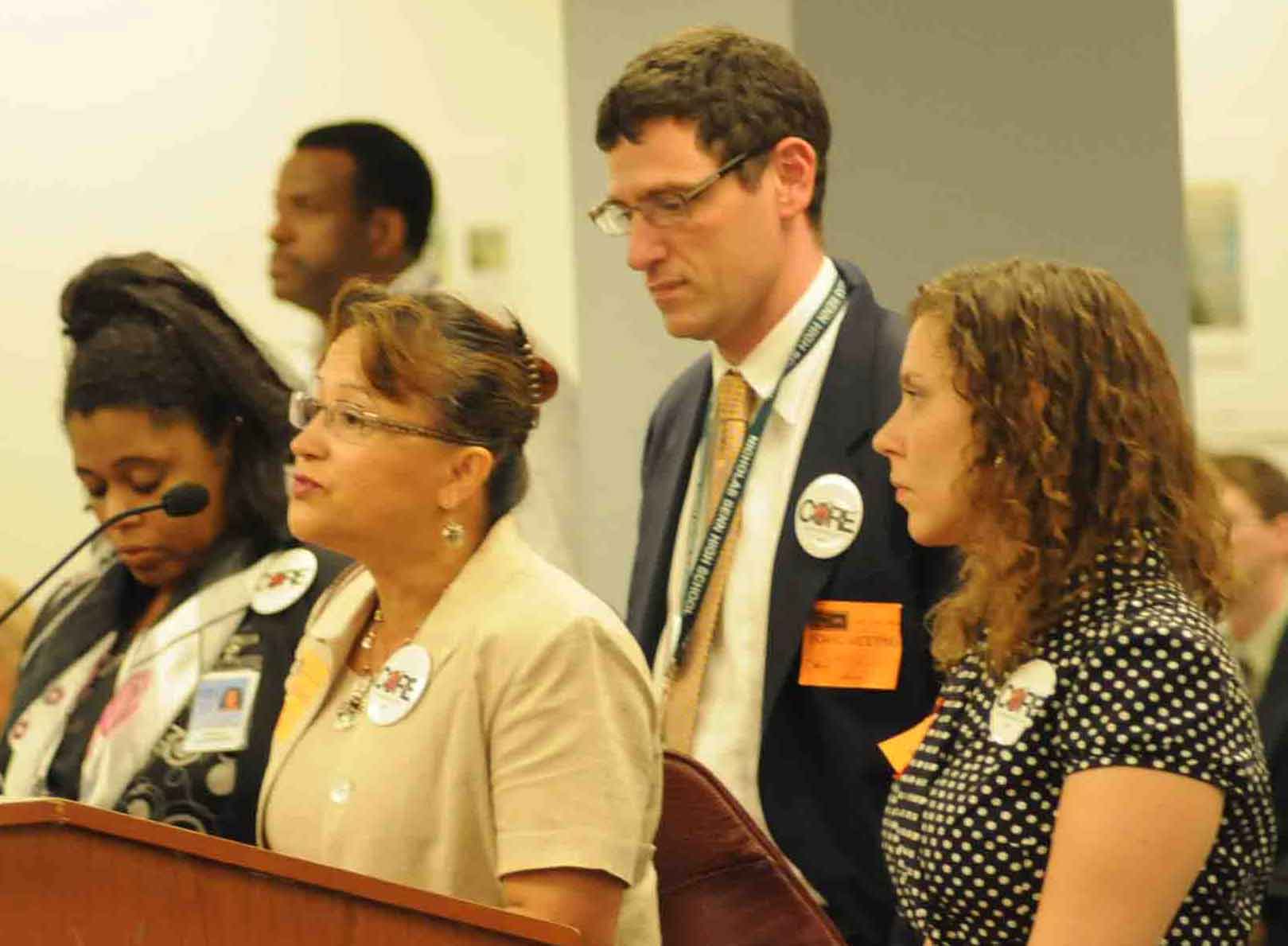 Clemente High School teacher Sara Echevarria (above at microphone speaking to the May 26, 2010 meeting of the Chicago Board of Educaton) has been appointed by Karen Lewis to head the CTU grievance department during the summer transition. Standing with Echevarria are (left to right) Patricia Breckenridge, a displaced teacher, Jesse Sharkey (now CTU vice president) and Kristine Mayle (now CTU financial secretary). Substance photo by George N. Schmdt.