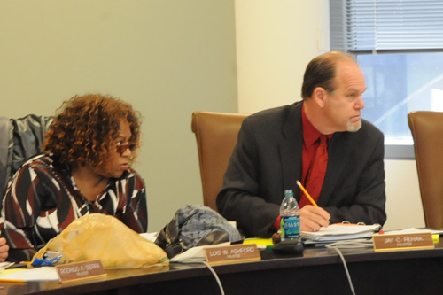 Chicago Teachers Pension Fund trustees Lois Ashford (left) and Jay Rehak (right) are both teachers currently working in the classrooms of Chicago and completing their first three-year term as pension trustees. Ashford and Rehak were first elected in an upset in October 2009 and have been serving since then. Above, they are seen in action during the CTPF meeting of November 2011. Substance photo by George N. Schmidt.