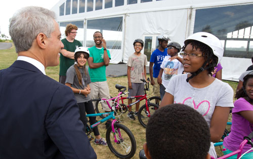 The photograph above was provided to Chicago media by the Mayor's Press Office, City of Chicago, on August 1 2013. It came complete with a caption and credit. The photo was supposed to be credited to Brook Collins, who works for Rahm Emanuel and follows him around every day as part of his 