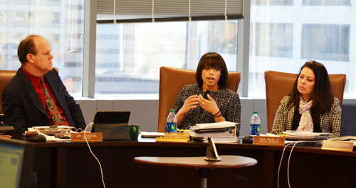 Chicago Teachers Pension Fund attorney Tiffany Reeves (center) explained the complexities of divestment from weapons manufacturers to the trustees at the January 17, 2013 meeting of the fund. Left to right above, Jay Rehak (teacher at Whitney Young High School and President of CTPF), Tiffany Reeves, and Tina Padilla (teacher at Lane Tech High School and trustee of the Fund). Substance photo by George N. Schmidt.