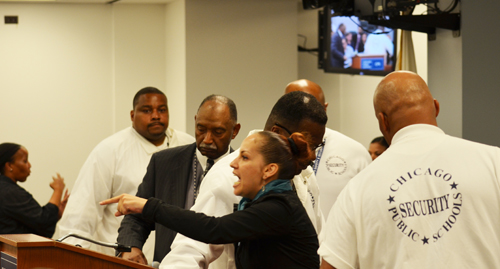 After she had stood alone for less than two minutes denouncing the attacks on democracy and real public schools by the members of the Chicago Board of Education and 