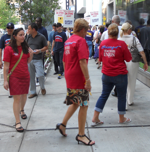 Chicago Teachers Union researcher Sarah Hainds (left) showing solidarity with striking security guards at 161 W. Kinzie building on September 1, 2011. Substance photo by George N. Schmidt.