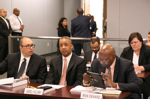 By the March 23, 2016 meeting of the Chicago Board of Education, the newly appointed members of the Claypool bureaucracy knew that they didn't have to pay attention to the members of the public during public participation at Board meetings, so they didn't. Above, three of the five six-figure Claypool appointees demonstrate distracted democracy during the meeting. Substance photo by David Vance.