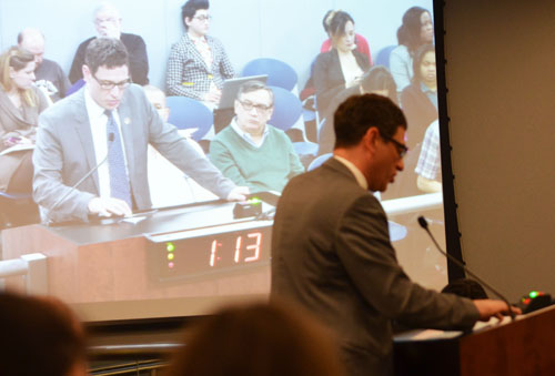 Chicago Teachers Union Vice President Jesse Sharkey asked the Board of Education to continue to resist the imposition of the PARCC tests on all CPS schools. He also reminded the Board members, all of whom are appointed by Mayor Rahm Emanuel, that the day before the Board meeting, citizens of Chicago in 37 wards had voted by a nine to one margin that the city should have an elected school board. Substance photo by George N. Schmidt.