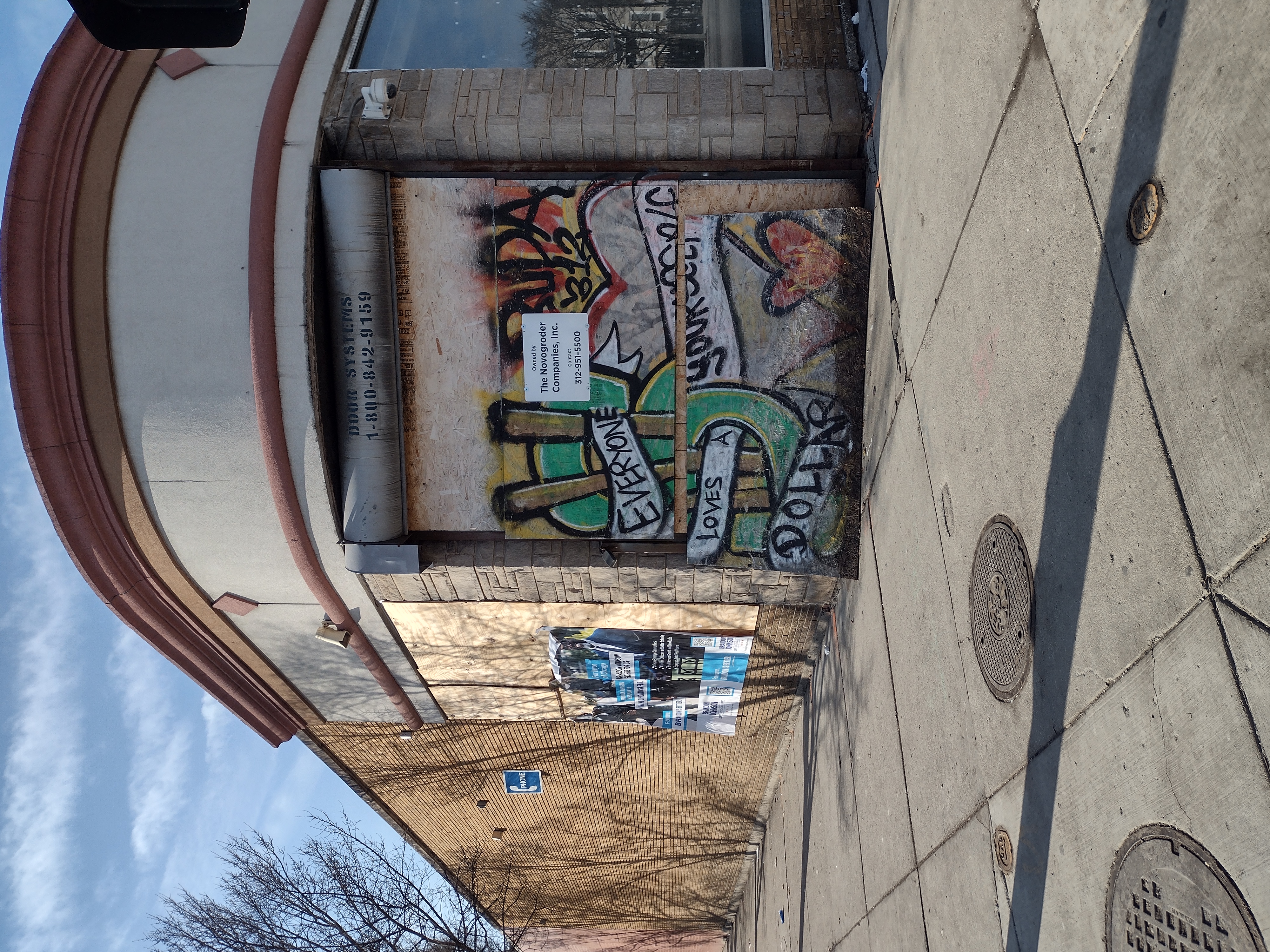 Chicago and Homan the heart of the west-side of Chicago and main street corner. as you can see the buildings are shuttered and messed up looking. yet there are vote for me signs by brandon johnson plastered all over. maybe he should fix the place up before asking for peoples votes. Credit John Kugler