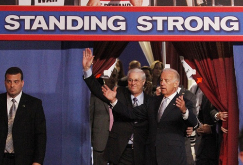 National Education Association President Dennis Van Roekel (center) and U.S. Vice President Joe Biden (right) go on stage at the NEA convention on July 3, 2011. Substance photo by John Kugler.