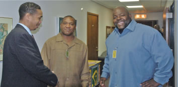 Board of Education security guards barred Rev. Robin Hood (above center) of ACORN and Jitu Brown (above right) of the Kenwood Oakland Community Organization from the Board’s March 30 press conference on school closings. Nevertheless, the Board invited parents from the Sherman school and more than a  dozen administrative staff members (including David Pickens, above left) to the  event from which Hood and Brown were excluded. Substance photo by George N.  Schmidt. 