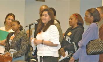 Curie High School remains before the Board. Curie High School student Danielle Martinez (above) brought the Board back to the question of the highly publicized vote of the Curie Local School Council not to renew the contract of popular principal Jerilynn Jones (below right). In sharp contrast to his hostile comments to representatives from Senn High School, Lawrence Elementary School, and others who were critical of the Board, Board President Rufus Williams devoted a good deal of time showing concern for the students from Curie. (Substance photo by George N. Schmidt).