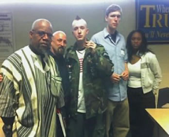 Participants in the March 28, 2007 debate on military recruitment and the war at Englewood High School. Left to right: Yusufu Mosley (of Critical Resistance); Barry Romo (of VVAW, Vietnam Veterans Against War); an active duty soldier in Iraq who asked that his name not be used; Aaron Hughes (Iraq Vets Against the War); and Englewood High School student Andrea Hendricks. Not pictured are Sergeant Maurice Flowers (Englewood ROTC instructor) and Major Harry McEwen (Englewood ROTC instructor). When Majoy McEwen tried to compare the dangers of life in the military to the dangers of driving an automobile and getting into an accident, Romo pointed out that the biggest danger facing military people is that they have to go and kill other people. A student asked McEwen whether he had ever faced the life-and-death situations of combat, and he told them that he hadn’t. (Substance photo by Jackson Potter).