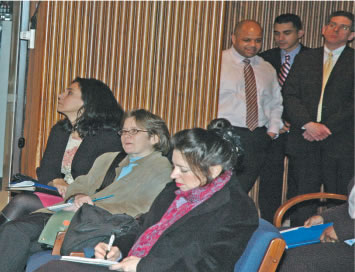 Although Board of Education security guards excluded community activists from the press conference (stating that the event was restricted to “credentialed press”), Arne Duncan actually packed the room with highly paid executive staff. Above left, Theresa Garate (currently a “Senior Manager” in Special Education at $104,000 per year sits beside Tribune reporter Stephanie Banchero and Sun Times reporter Rosalind Rossi, while other top staff (including Patrick Rocks, the Board Corporation Counsel, far right, look on. There were more administrators than reporters in the press room for the March 30 school closing press conference, despite the exclusion of the community activists because the event was supposedly limited to “credentialed press.” (Substance photo by George N. Schmidt.