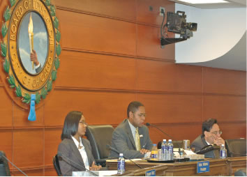 Board President continues to provoke speakers. At several points during the March 28 meeting, Board President Rufus Williams (above, center) responded with hostility to comments from parents and the public. At the March 28 meeting, the Board deliberately packed most of the seats in the Board chambers with its own executive staff and with “social worker interns” so that most of the public was forced to watch the proceedings on closed circuit TV twelve floors away.  The Lawrence Elementary School controversy had caused concern to some Board officials because it was being widely reported and followed on a blog (District 299.com) that is read by many people around the country for information regarding CPS. By April 6, the blog had 92 pages of postings about the Lawrence crisis. (Substance photo by George N. Schmidt).