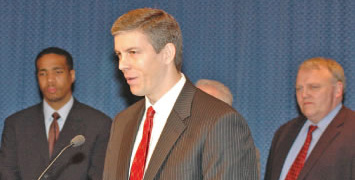 Flanked by David Pickens (left, currently his $132,000 per year “Chief of Staff”) and Dan Bugler (right, currently “Chief Officer, Research, Evaluation and Accountability” at $132,000 per year), Chicago Schools CEO Arne Duncan explains at a March 30, 2007, press conference why Chicago is going to reconstitute Harvard Elementary School despite the fact that Harvard’s ISAT test scores went “up” this school year and reconstitution is regarded nationally as a failed strategy for fixing schools whose scores went “down.” (Substance photo by George N. Schmidt) 