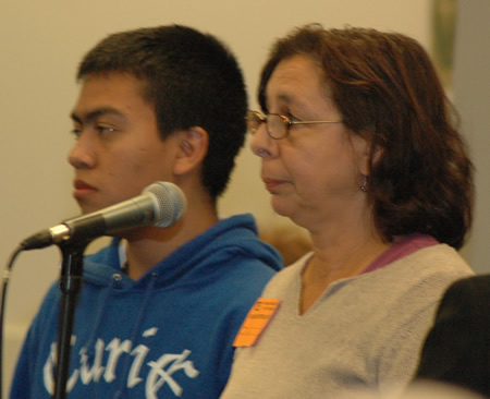 October 24, 2007. Darlene Gramigna (above at microphone) of the American Friends Service Committee thanked the Board for promising to ensure that all Chicago high school students are notified of their right to opt out of the military recruiting provisions of “No Child Left Behind.” According to Board officials, every student and family was to be given an opt out form barring military recruiters from receiving personal information at the November 7 high school report card pickup. One of the many provisions of “No Child Left Behind” is that school districts inform the military of the names and home addresses and phone numbers of all high school students for military recruiting purposes. Students at numerous Chicago public and charter schools had protested the recruiters since the protests against militarization began at Senn High School in 2004. Photo by George N. Schmidt.