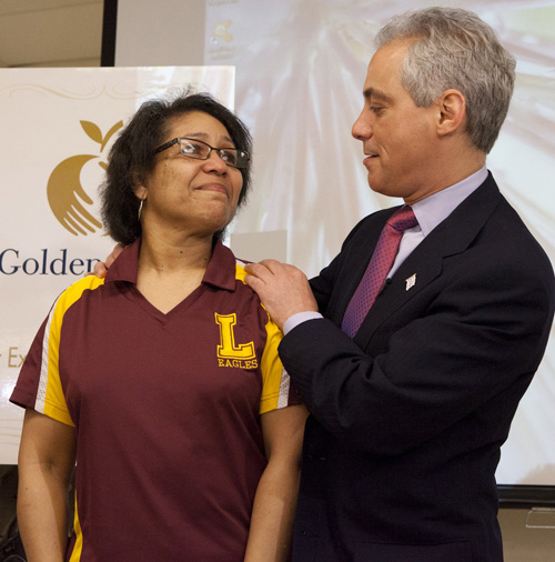 The mayor's publicity stunt photograph depicting Rahm being nice to a teacher. The photo was provided to the press by the Mayor's Press Office on May 1, 2013. 