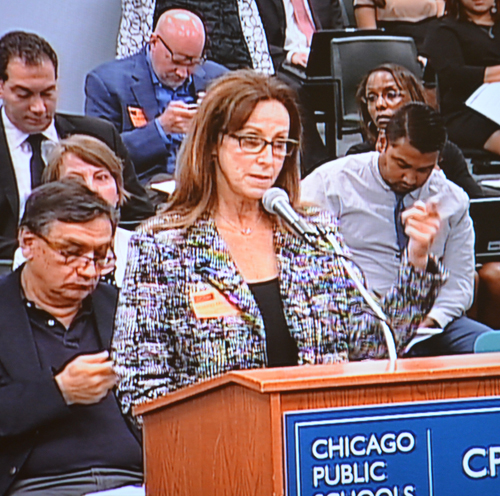 Dianne Daleiden speaks to the Board of Education's July 23, 2014 meeting about the attempt by American Quality Schools to expand the number of seats at the Passages Charter School which it operates against the community's wishes in the Andersonville Community on Chicago's North Side. Substance photo by George N. Schmidt.