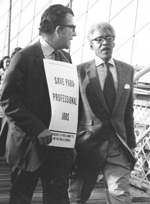 United Federation of Teachers President Albert Shanker (left) with civil rights leaders Bayard Rustin (right) crossing the Brooklyn Bridge during one of the UFT's actions for public education in New York.