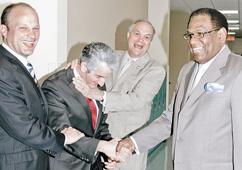 The man second from left in the above photograph, depicted as bowing before the mayor and school board chief of New Haven Connecticut, is David Cicarella, President of the New Haven Federation of Teachers, a local of the American Federation of Teachers. The above photograph, which had to have been approved by Cicarella, illustrated the May 9, 2013 article entitled 