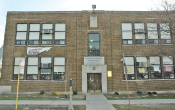 While the Chicago newspapers were filled recently with page one stories about how a convicted sex offender had just served as an election judge at a Chicago elementary school, the December 2006 child porn guilty plea by Joseph Nurek was reported in the back pages. Nurek had served as principal of the Chicago International Charter School Belden Campus (above) until his 2004 arrest. In addition to the prison time he will receive for his child porn guilty plea, Nurke is still facing charges that he transported a minor across state lines for sex. Deregulated, charter schools do not screen their teachers and administrators as carefully as public schools are required to. (Substance photo by George N. Schmidt).  
